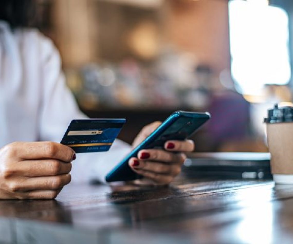 Pay for goods by credit card through a smartphone in a coffee sh